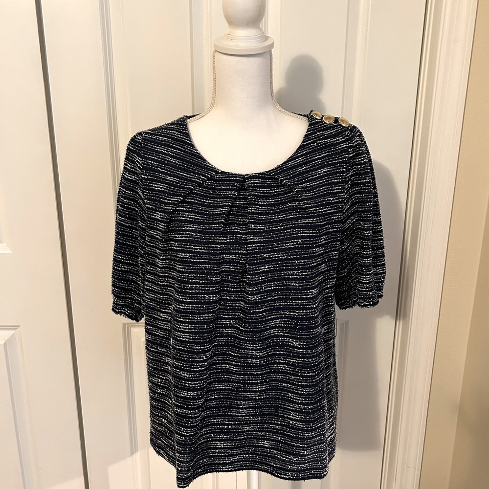 Women’s blue Charter Club top with gold button detail on the shoulder.